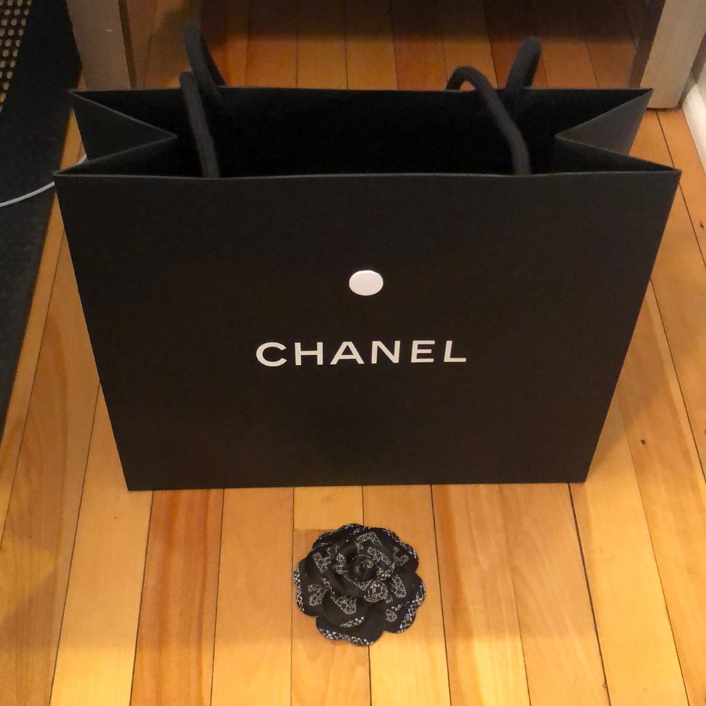 Chanel shopping bag with black camellia flower